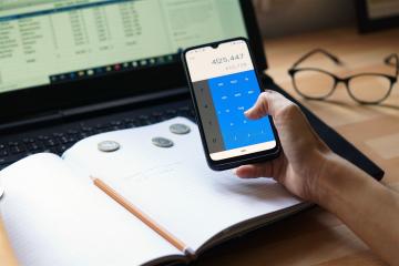 closeup-shot-entrepreneur-working-from-home-his-personal-finances-savings (1)